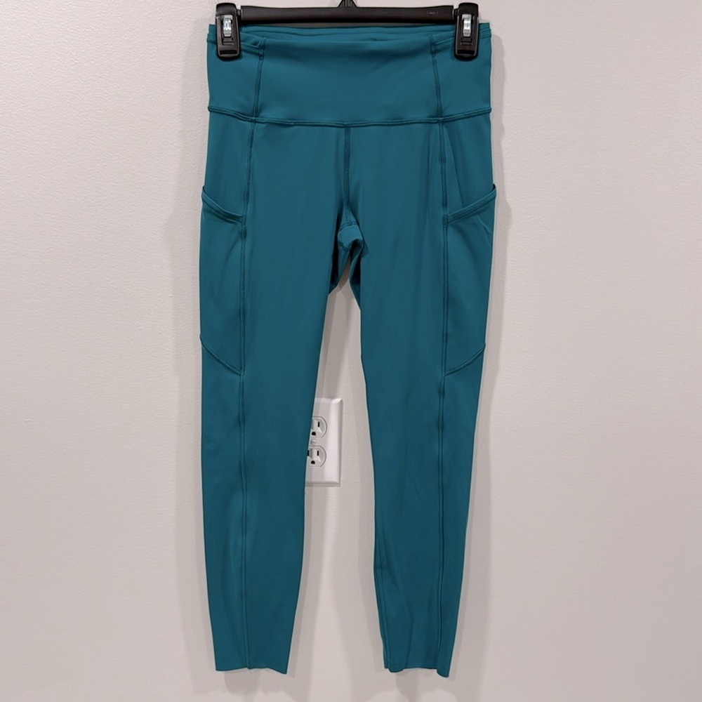 Lululemon Athletica Fast and Free Teal Leggings with pockets 23” Size 6 EUC
